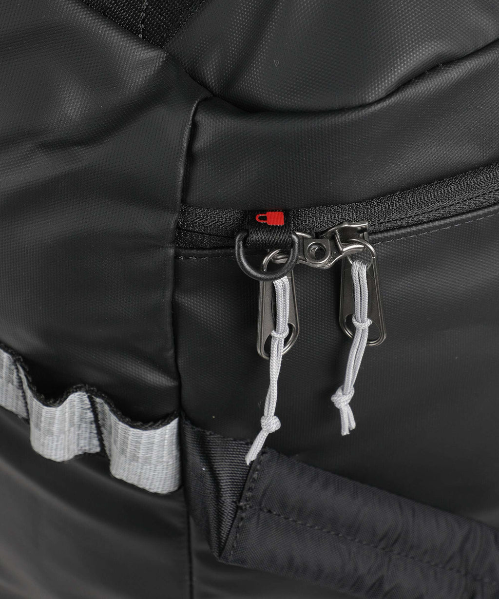 Eastpak Tarp Duffel Pack M Travel bag with wheels reflect