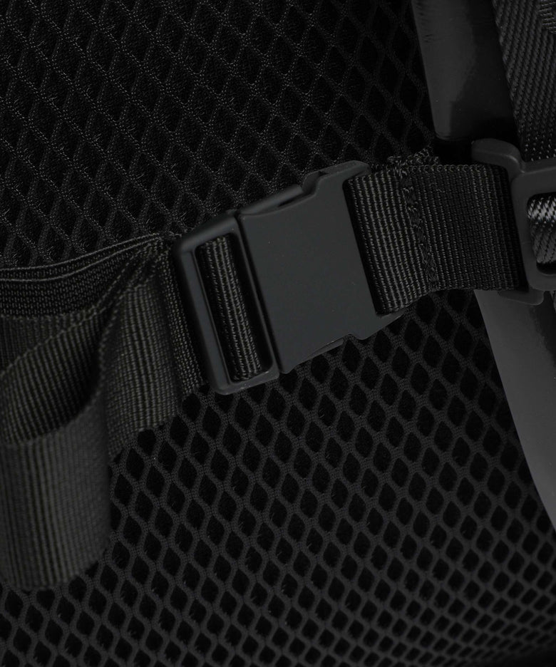 Rains Trail Rolltop backpack night